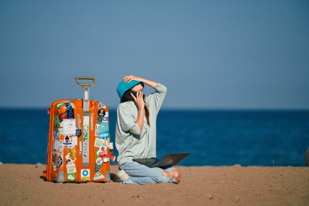 woman suitcase beach